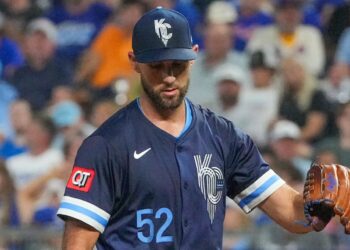 Jul 11, 2025; Kansas City, Missouri, USA; Kansas City Royals starting pitcher Michael Wacha (52) reacts after walking in a run against the New York Mets in the third inning at Kauffman Stadium. Mandatory Credit: Denny Medley-Imagn Images