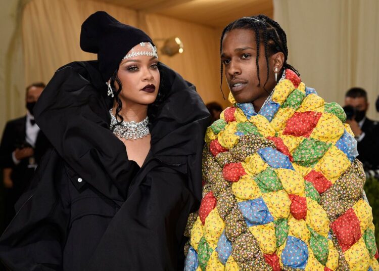 Rihanna, left, and A$AP Rocky attend The Metropolitan Museum of Art's Costume Institute benefit gala celebrating the opening of the "In America: A Lexicon of Fashion" exhibition on Sept. 13, 2021, in New York. (Photo by Evan Agostini/Invision/AP)