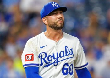 Aug 20, 2025; Kansas City, Missouri, USA; Kansas City Royals pitcher Lucas Erceg (60) reacts to a play during the seventh inning against the Texas Rangers at Kauffman Stadium. Mandatory Credit: William Purnell-Imagn Images