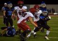 Shaun Young runs with the ball.