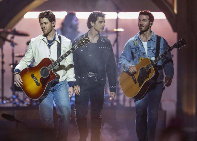 Nick, Joe and Kevin Jonas of the Jonas Brothers perform on Friday at Golden 1 Center.