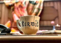 A coffee mug with the name Kermit on it