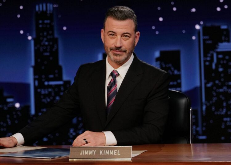 This image released by Disney shows Jimmy Kimmel hosting his late night show "Jimmy Kimmel Live!" in Los Angeles on Tuesday, Sept. 23, 2025. (Randy Holmes/Disney via AP)