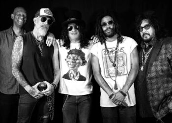 Slash’s Blues Ball band, studio portrait.