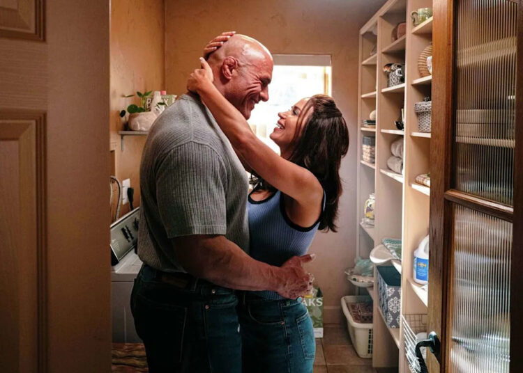 This image released by A24 shows Emily Blunt, right, and Dwayne Johnson in a scene from "The Smashing Machine." (A24 via AP) (Associated Press)