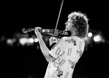 Sam Bush playing fiddle
