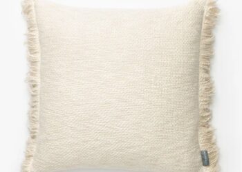 square cream cushion with tassel edge