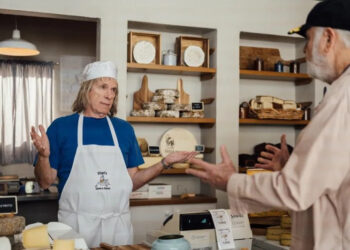 Marty DiBergi (Rob Reiner, R) finds Nigel Tufnel (Christopher Guest) in his cheese shop in "Spinal Tap II: The End Continues," in theaters Friday. Photo courtesy of Bleecker Street