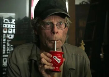 Stephen King drinking from a straw in IT: Chapter 2.