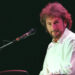 Rick Davies sits at the keyboard during Supertramp show