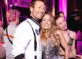 Former costar Glen Powell wore a NASA astronaut outfit to the space-themed event!
