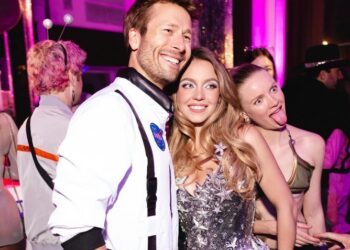 Former costar Glen Powell wore a NASA astronaut outfit to the space-themed event!