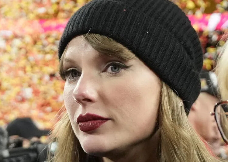 Taylor Swift stands on the field after the Kansas City Chiefs defeated the Buffalo Bills 32-29 in the AFC Championship Game at Arrowhead Stadium in Kansas City, Mo., in January. File Photo by Jon Robichaud/UPI