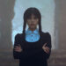 Wednesday with arms crossed outside in cemetery in Wednesday Season 2.
