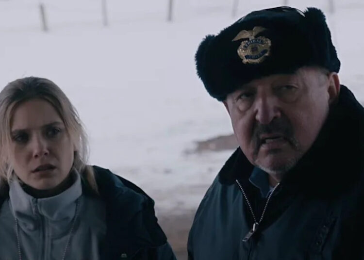 Elizabeth Olsen and Graham Greene in Wind River.