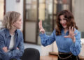 Mare and Esmeralda talking on The Paper Season 1 Episode 8.