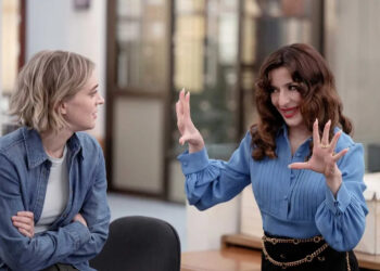 Mare and Esmeralda talking on The Paper Season 1 Episode 8.