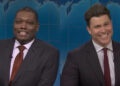 Michael Che and Colin Jost side by side during Weekend Update on SNL.