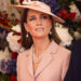 The Princess of Wales (Kate) wears pale pink Dior as she stands in front of red, white and blue flowers at the official welcome at the start of the State Visit to the UK by President Macron of France