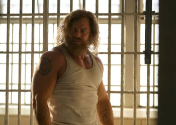 Alan Ritchson plays an escaped convict on a quest for vengeance in the 1970s-set action thriller "Motor City."