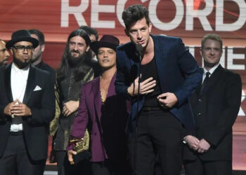 Kevin Mazur/WireImage Mark Ronson accepts his award at the 58th Grammy Awards with Bruno Mars in 2016