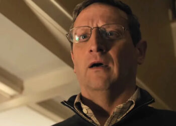 A shocked Tim Robinson in eyeglasses in The Chair Company