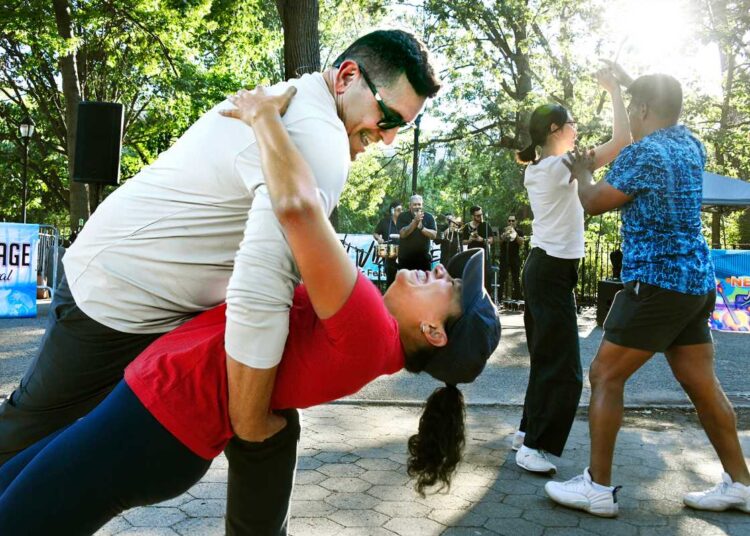 couple dipping during dance at East Village Tompkins Square Park
