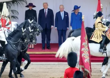 PA Media President Trump, Melania Trump, the King and Queen Camilla watching a military parade in Windsor Castle