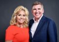 Julie and Todd Chrisley pose for a photo.