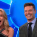 Vanna White and Ryan Seacrest smiling big on Wheel of Fortune.