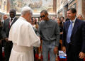 Pope Leo shakes hands with American singer Pharrell Williams at the Vatican, on Friday. A varied mix of thinkers and music artists convened to discuss everything from agriculture to sport. - Simone Risoluti/Vatican Media/Reuters