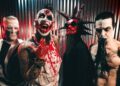 Members of Mudvanye look menacing. One of them is covered in blood, while the other is painted red and sports black and red spiked hair.