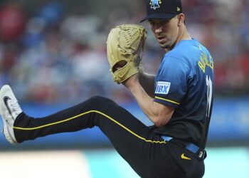 Walker Buehler leads Phillies past Royals in his debut