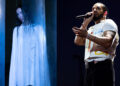 Julia Wolf stands behind a translucent blue curtain, and Drake stands with a microphone while performing on stage at night.