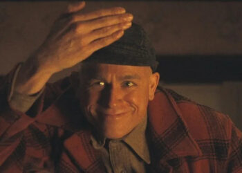 Charlie Hunnam makes a creepy face as Ed Gein in Monster: The Ed Gein Story