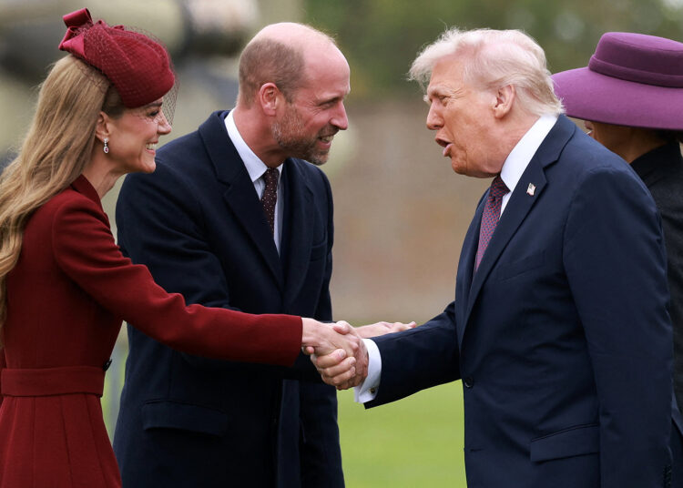 TOPSHOT - US President Donald Trump and First Lady Melania Trump are greeted by Britain's Prince William, Prince of Wales and Britain's Catherine, Princess of Wales, upon their arrival at the grounds of Windsor Castle, in Windsor, on September 17, 2025, for the start of a second State Visit. (Photo by Ian Vogler / POOL / AFP) (Photo by IAN VOGLER/POOL/AFP via Getty Images)