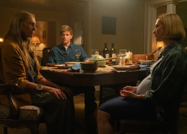 three women around a dinner table