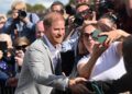 The Duke of Sussex greets people after visiting the Community Recording Studio in Nottingham. Pic: PA