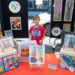young artist at a display