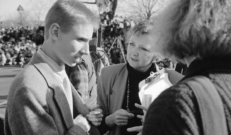 Archival image from the documentary Deaf President Now! featuring students and staff conferring about the protest at hand.