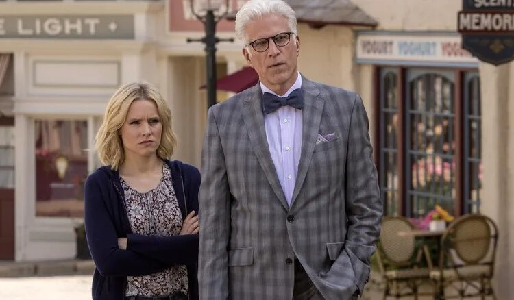 Eleanor stands behind Michael with arms folded in The Good Place