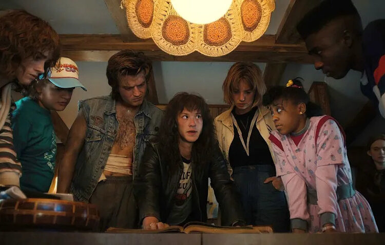 Netflix From left: Natalia Dyer as Nancy Wheeler, Gaten Matarazzo as Dustin Henderson, Joe Keery as Steve Harrington, Joseph Quinn as Eddie Munson, Maya Hawke as Robin Buckley, Priah Ferguson as Erica Sinclair, Sadie Sink as Max Mayfield, and Caleb McLaughlin as Lucas Sinclair in 'Stranger Things' season 4