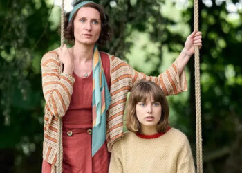 Nancy and Decca on a swing in Outrageous