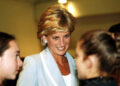 Diana, Princess of Wales, speaks with dancers at the studios of the English National Ballet August 2..