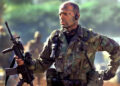 A. K. Waters with a gun in "Tears of the Sun"