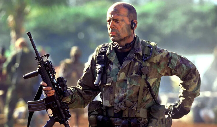 A. K. Waters with a gun in "Tears of the Sun"