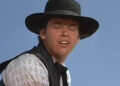 Jack Nicholson's Billy Spear is seen in closeup against a blue sky in The Shooting