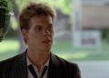 Kevin Bacon as Ren McCormack wearing a suit in Footloose (1984)