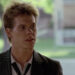 Kevin Bacon as Ren McCormack wearing a suit in Footloose (1984)