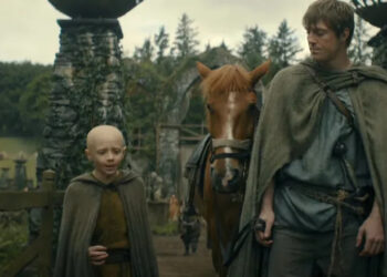 Peter Claffey as Ser Duncan and and Dexter Sol Ansell as Egg walking on a village road in A Knight of the Seven Kingdoms